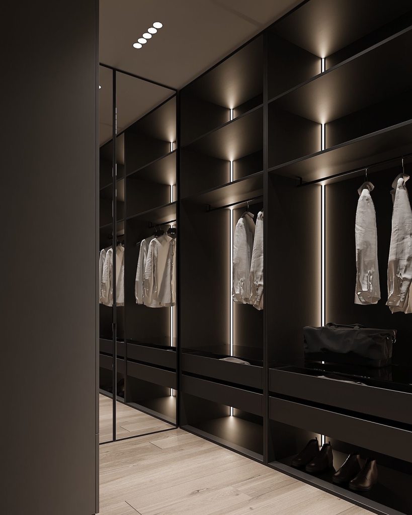 Dark wardrobe with vertical lighting and mirrored panels