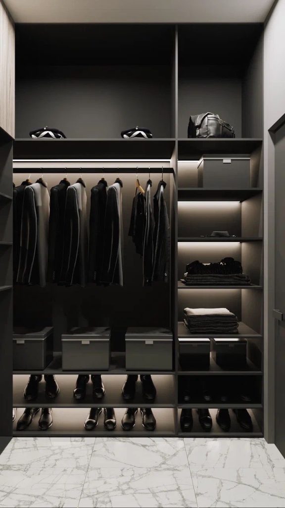 Open black wardrobe with integrated shelf lighting
